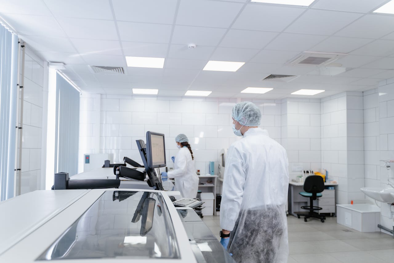 Laboratory professionals conducting research in a modern, well-equipped lab environment.